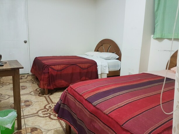Imagen de la habitación del Hotel Hospedaje Puriq - Hostel. Foto 18