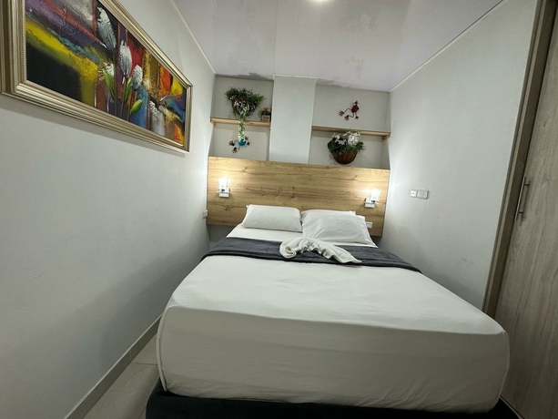 Imagen de la habitación del Hotel Hospedarte Cali. Foto 13