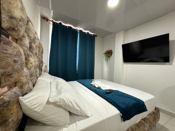 Imagen de la habitación del Hotel Hospedarte Cali. Foto 16