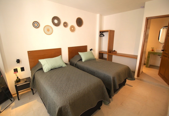 Imagen de la habitación del Hotel Hospedarte Central. Foto 15