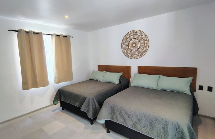Imagen de la habitación del Hotel Hospedarte Central. Foto 16