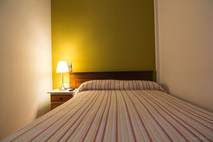 Imagen de la habitación del Hotel Hospederia Don Quijote. Foto 16