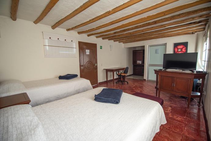 Imagen de la habitación del Hotel Hospederia El Portal de las Flores, Chia. Foto 5
