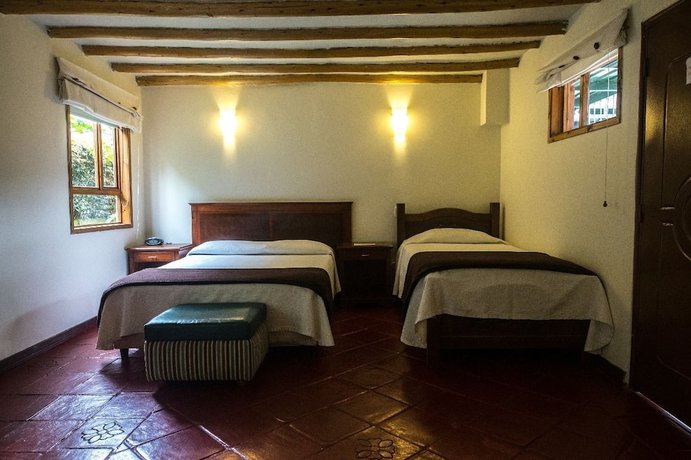 Imagen de la habitación del Hotel Hospederia El Portal de las Flores, Chia. Foto 12
