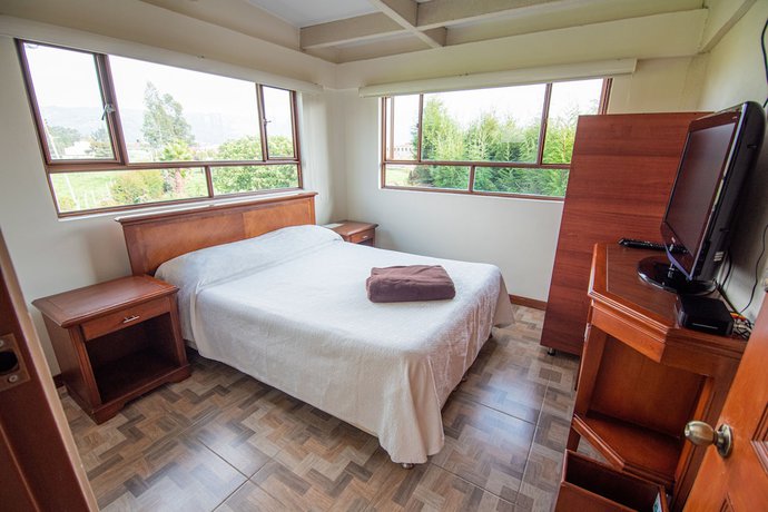 Imagen de la habitación del Hotel Hospederia El Portal de las Flores, Chia. Foto 14
