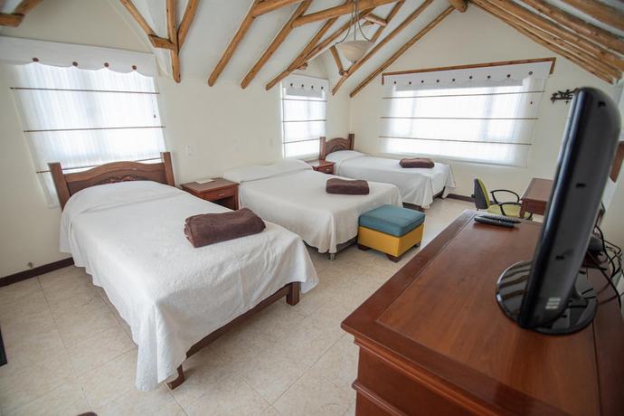 Imagen de la habitación del Hotel Hospederia El Portal de las Flores, Chia. Foto 16