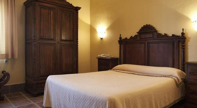 Imagen de la habitación del Hotel Hospedería Santiago. Foto 7
