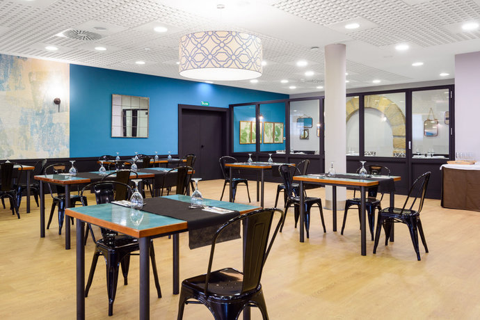 Imagen del bar/restaurante del Hotel Hospedium Don Fidel. Foto 4