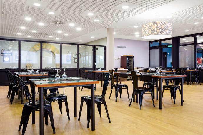 Imagen del bar/restaurante del Hotel Hospedium Don Fidel. Foto 6