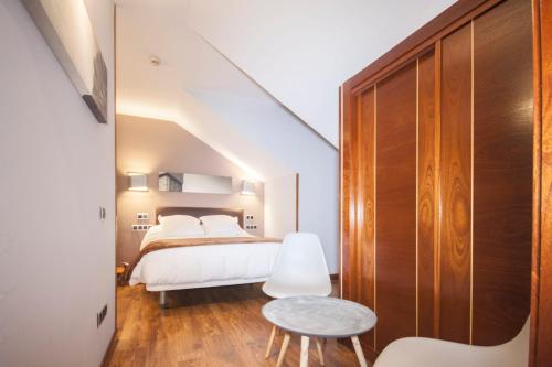 Imagen de la habitación del Hotel Hospedium La Casona del Conde. Foto 5