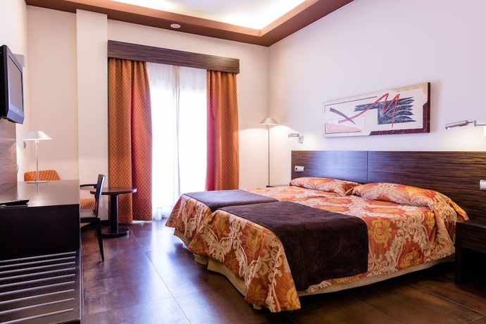 Imagen de la habitación del Hotel Hospedium Los Periquitos. Foto 6