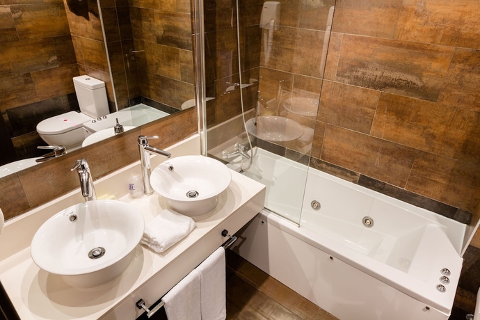 Imagen de la habitación del Hotel Hospedium Los Periquitos. Foto 12