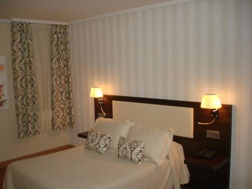 Imagen de la habitación del Hotel Hospedium Triana. Foto 14