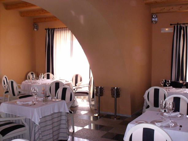 Imagen del bar/restaurante del Hotel Hospes Palacio De Arenales and Spa. Foto 2