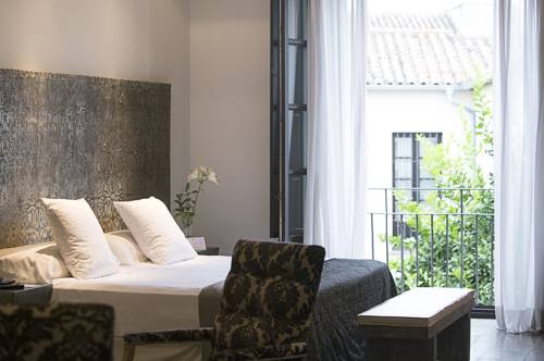 Imagen de la habitación del Hotel Hospes Palacio Del Bailío. Foto 6