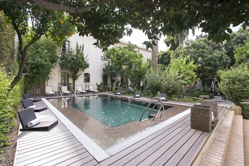 Imagen de la piscina del Hotel Hospes Palacio Del Bailío. Foto 18