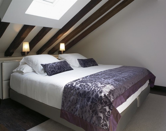 Imagen de la habitación del Hotel Hospes Puerta De Alcalá. Foto 4