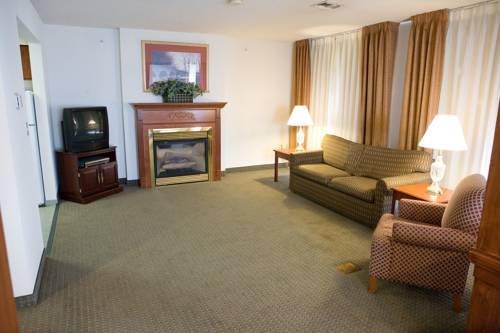 Imagen de la habitación del Hotel Host Inn All Suites. Foto 5