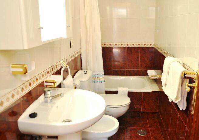 Imagen de la habitación del Hotel Hostal Bah&iacute;a. Foto 18