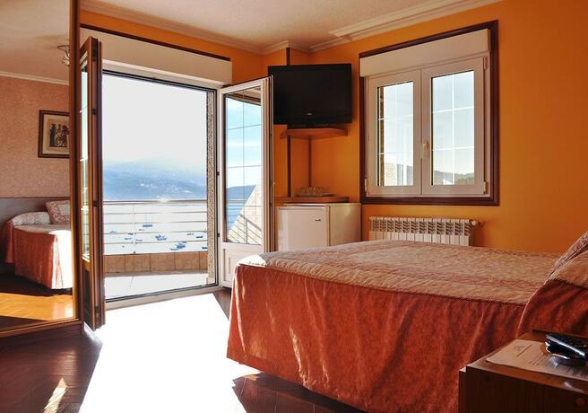 Imagen de la habitación del Hotel Hostal Bah&iacute;a. Foto 20