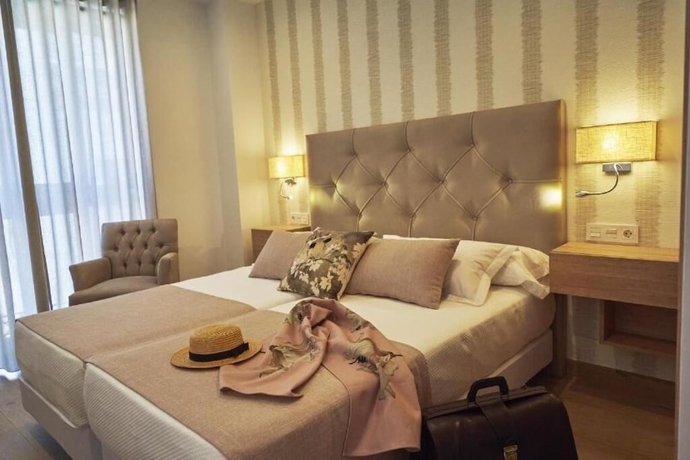 Imagen de la habitación del Hotel Hostal Boutique Aurora. Foto 13