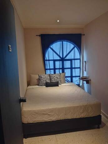 Imagen de la habitación del Hotel Hostal Boutique Casa Mosaiko Nutibara. Foto 12