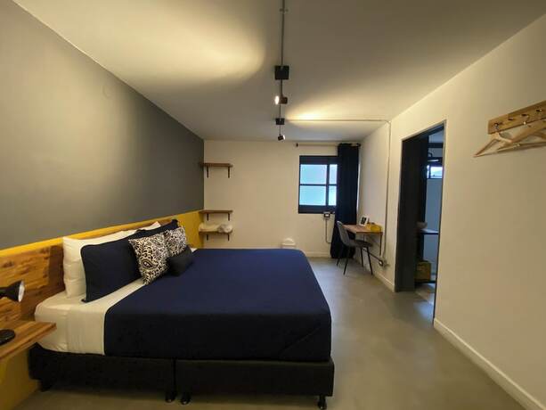 Imagen de la habitación del Hotel Hostal Boutique Casa Mosaiko Primer Parque. Foto 12