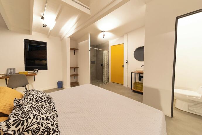 Imagen de la habitación del Hotel Hostal Boutique Casa Mosaiko Primer Parque. Foto 17