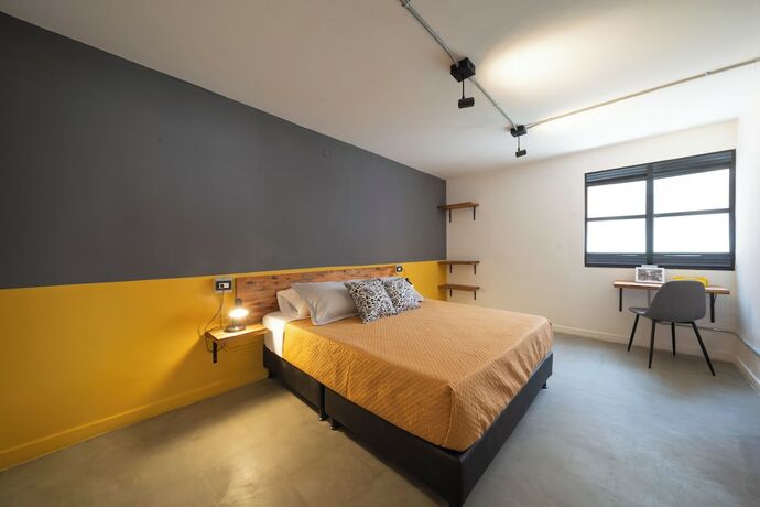 Imagen de la habitación del Hotel Hostal Boutique Casa Mosaiko Primer Parque. Foto 19