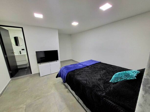 Imagen de la habitación del Hotel Hostal Caps Corferias. Foto 10