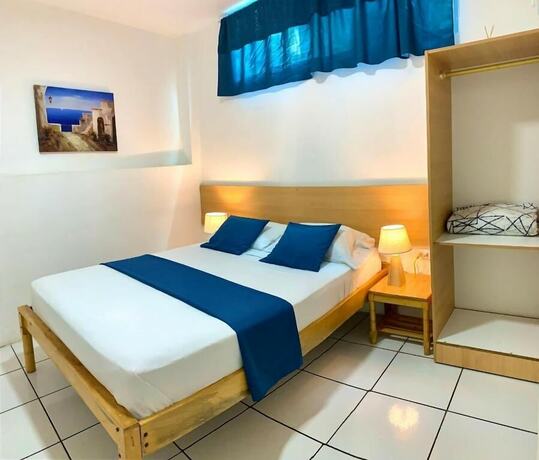Imagen de la habitación del Hotel Hostal Casa Latina. Foto 12