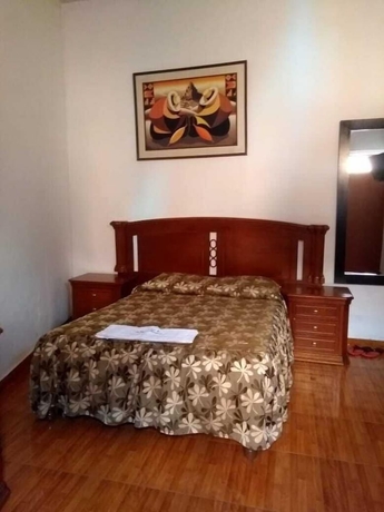 Imagen de la habitación del Hotel Hostal Characato Suite. Foto 5