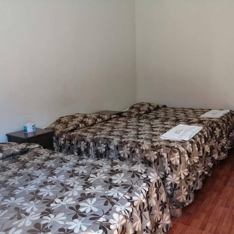 Imagen de la habitación del Hotel Hostal Characato Suite. Foto 6