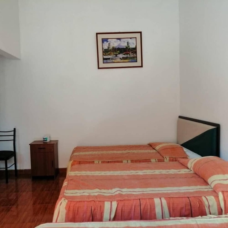 Imagen de la habitación del Hotel Hostal Characato Suite. Foto 7