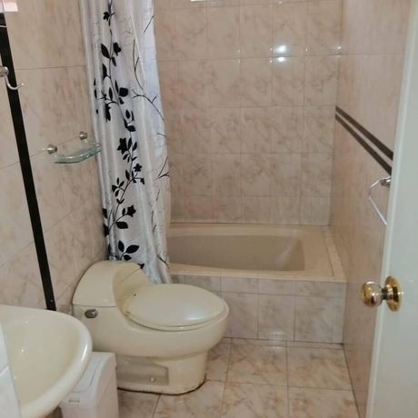 Imagen de la habitación del Hotel Hostal Characato Suite. Foto 8