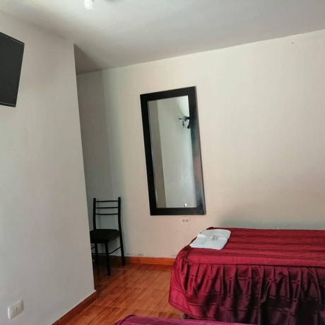 Imagen de la habitación del Hotel Hostal Characato Suite. Foto 9