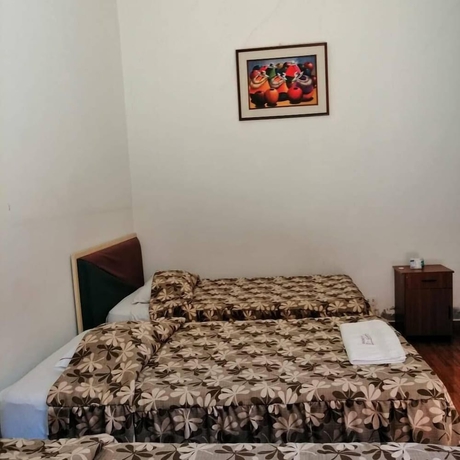 Imagen de la habitación del Hotel Hostal Characato Suite. Foto 11