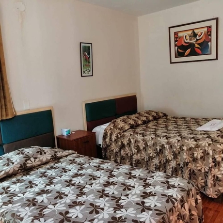 Imagen de la habitación del Hotel Hostal Characato Suite. Foto 13