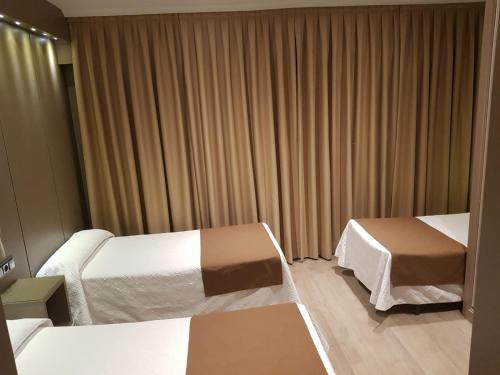 Imagen de la habitación del Hotel Hostal Colon. Foto 19