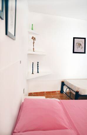 Imagen de la habitación del Hotel Hostal Dumbira. Foto 19