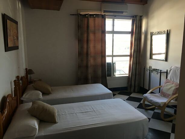 Imagen de la habitación del Hotel Hostal El Ancla. Foto 16