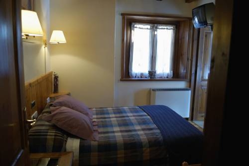 Imagen de la habitación del Hotel Hostal El Bouquet. Foto 4