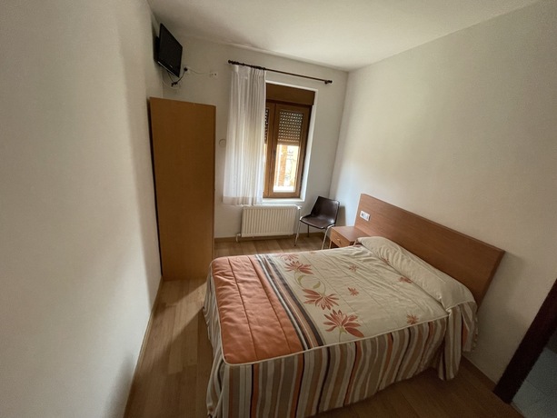 Imagen de la habitación del Hotel Hostal El Delfin Verde. Foto 12