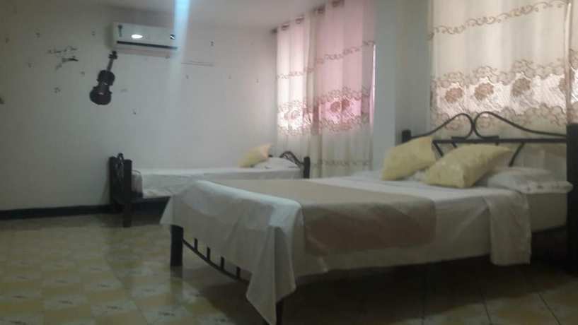 Imagen de la habitación del Hotel Hostal El Exito. Foto 2