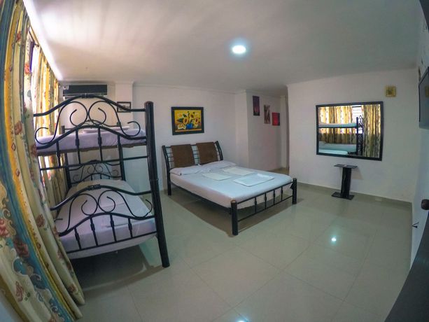 Imagen de la habitación del Hotel Hostal El Exito. Foto 4