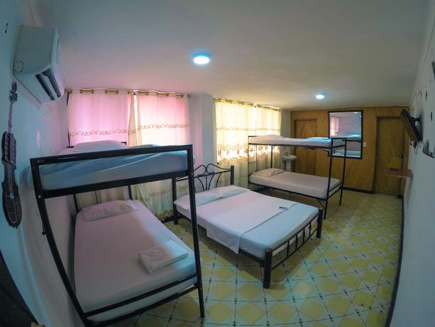 Imagen de la habitación del Hotel Hostal El Exito. Foto 10