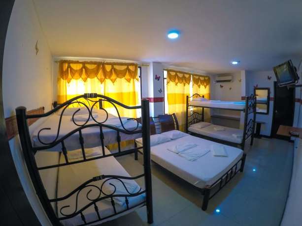Imagen de la habitación del Hotel Hostal El Exito. Foto 12