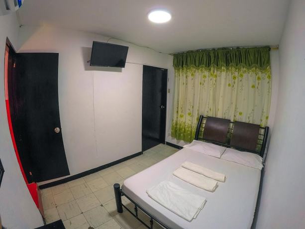 Imagen de la habitación del Hotel Hostal El Exito. Foto 16
