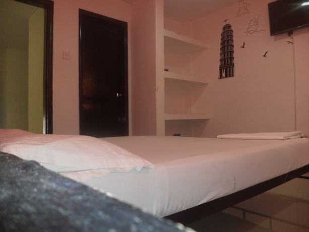 Imagen de la habitación del Hotel Hostal El Exito. Foto 18