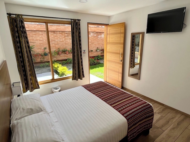 Imagen de la habitación del Hotel Hostal El Geranio. Foto 7